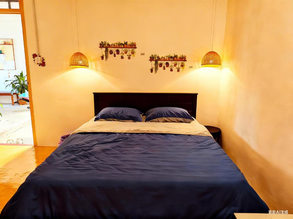 Ένα ή περισσότερα κρεβάτια σε δωμάτιο στο 玖月舒苑 8904