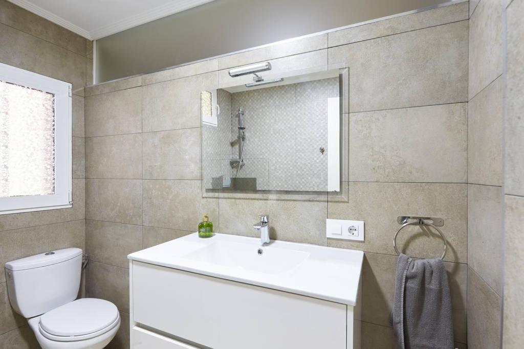 Koupelna v ubytování Acà Y Allà Apartamento Alfonso El Batallador