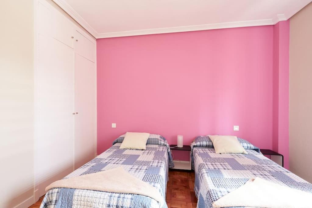 Postel nebo postele na pokoji v ubytování Acà Y Allà Apartamento Alfonso El Batallador