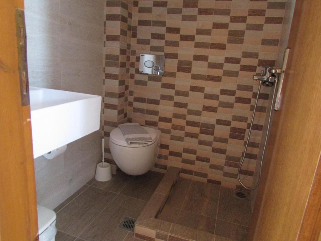 Łazienka w obiekcie Sevi Apartments