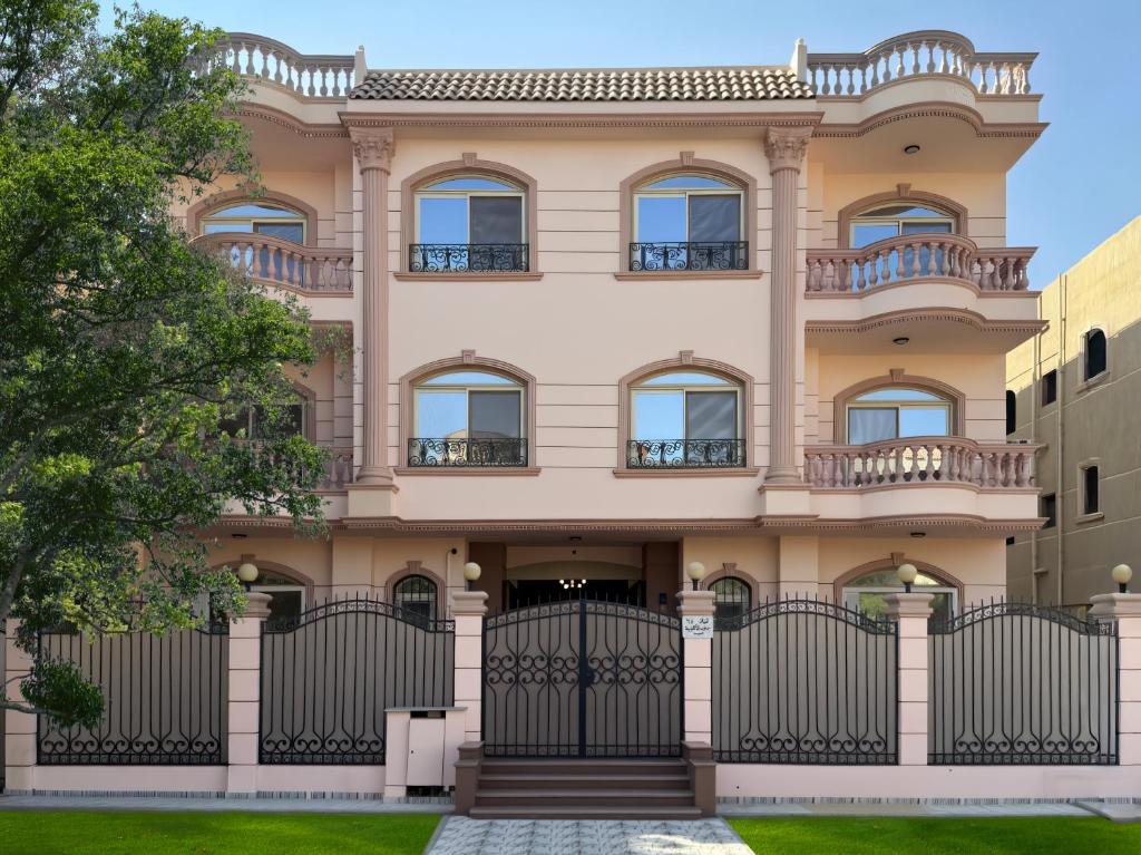 a house with a gate in front of it at 利恩之家 Maison Lienne in Cairo
