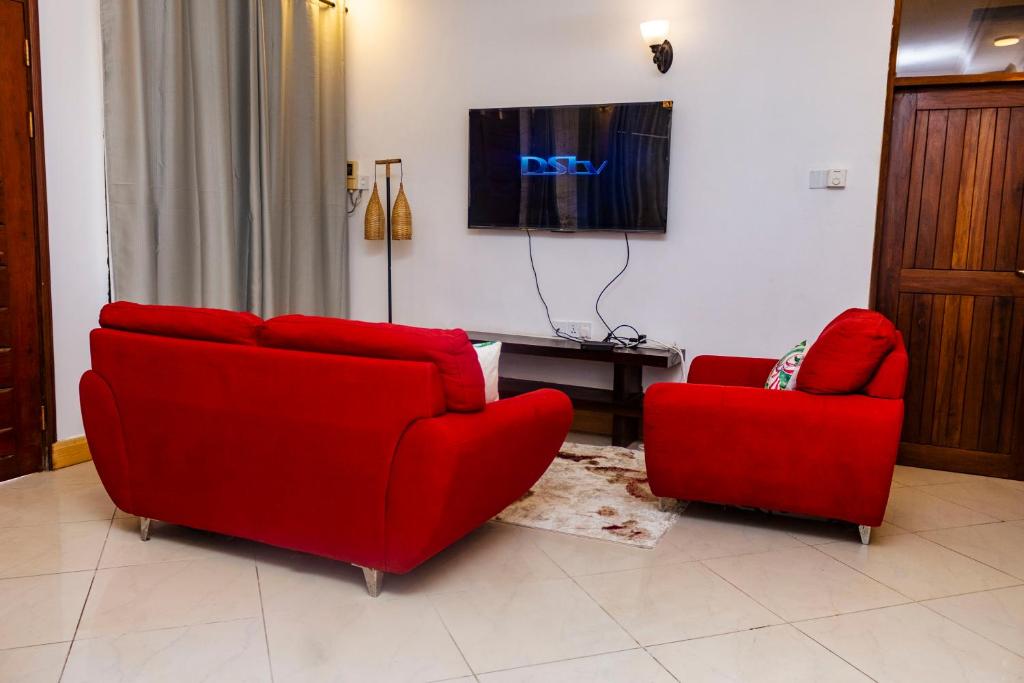 Μια τηλεόραση ή/και κέντρο ψυχαγωγίας στο Savannahs Kunduchi Villa