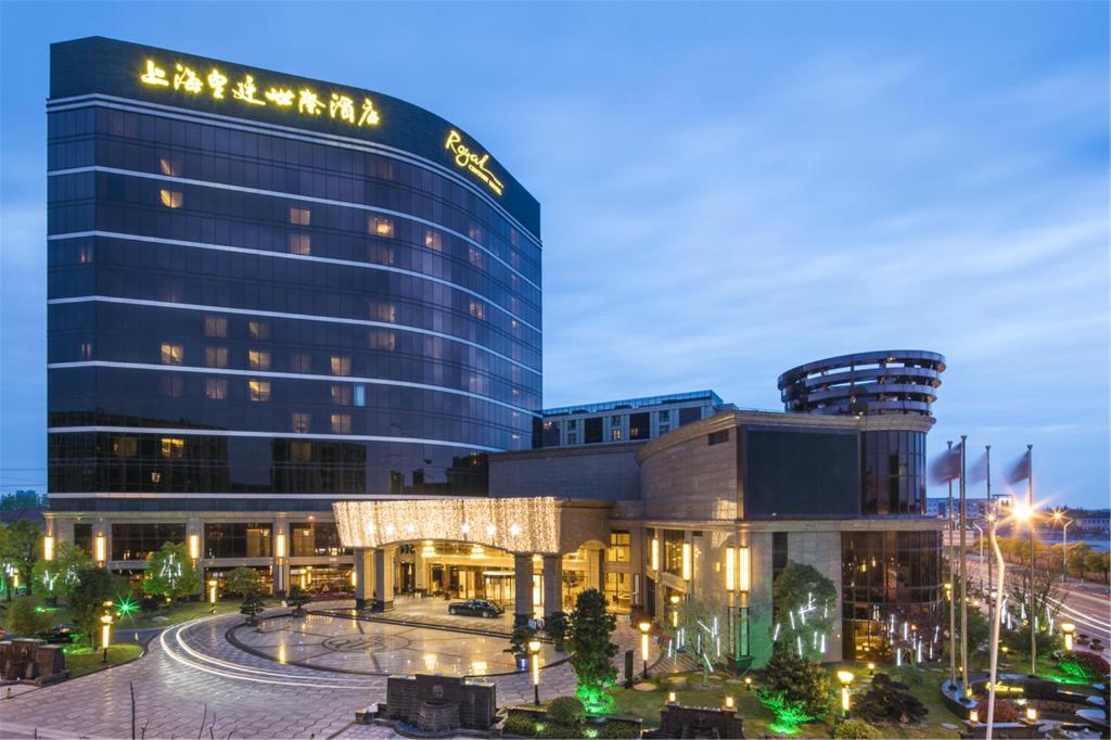 a view of a building at night at Royal Century Hotel Shanghai in Shanghai