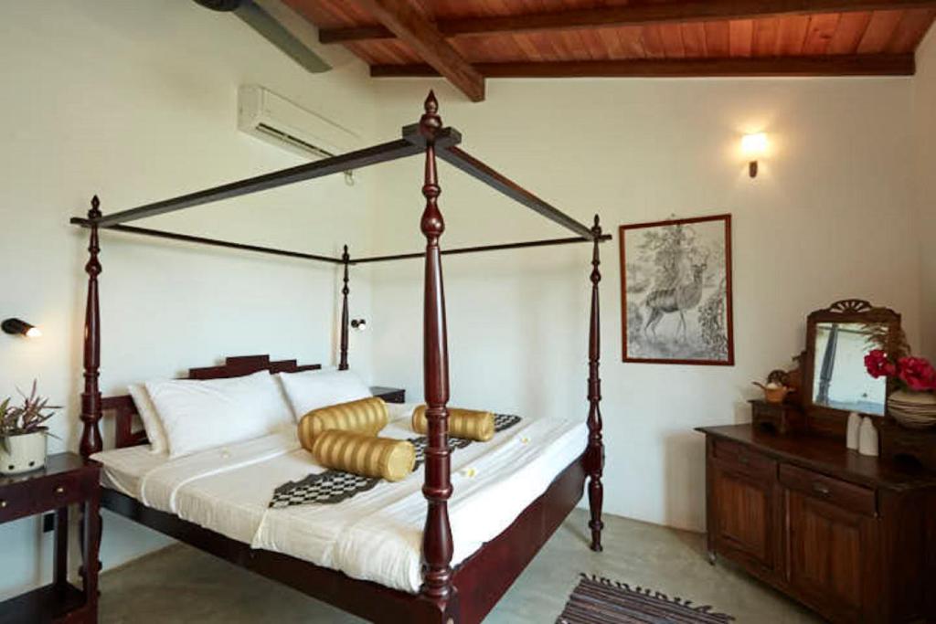 Postel nebo postele na pokoji v ubytování Villa Sunbird Negombo