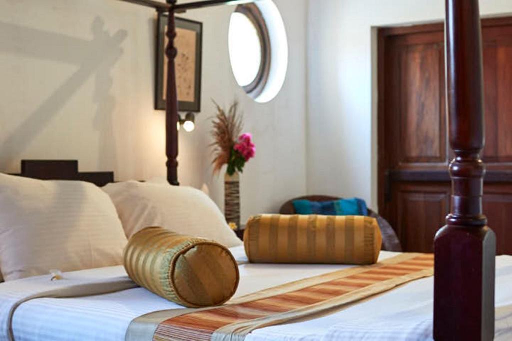 Postel nebo postele na pokoji v ubytování Villa Sunbird Negombo