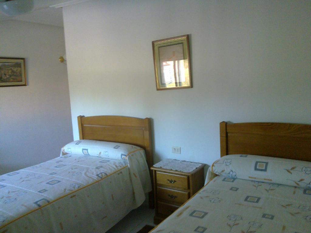 Postel nebo postele na pokoji v ubytování Hostal Sequeiros