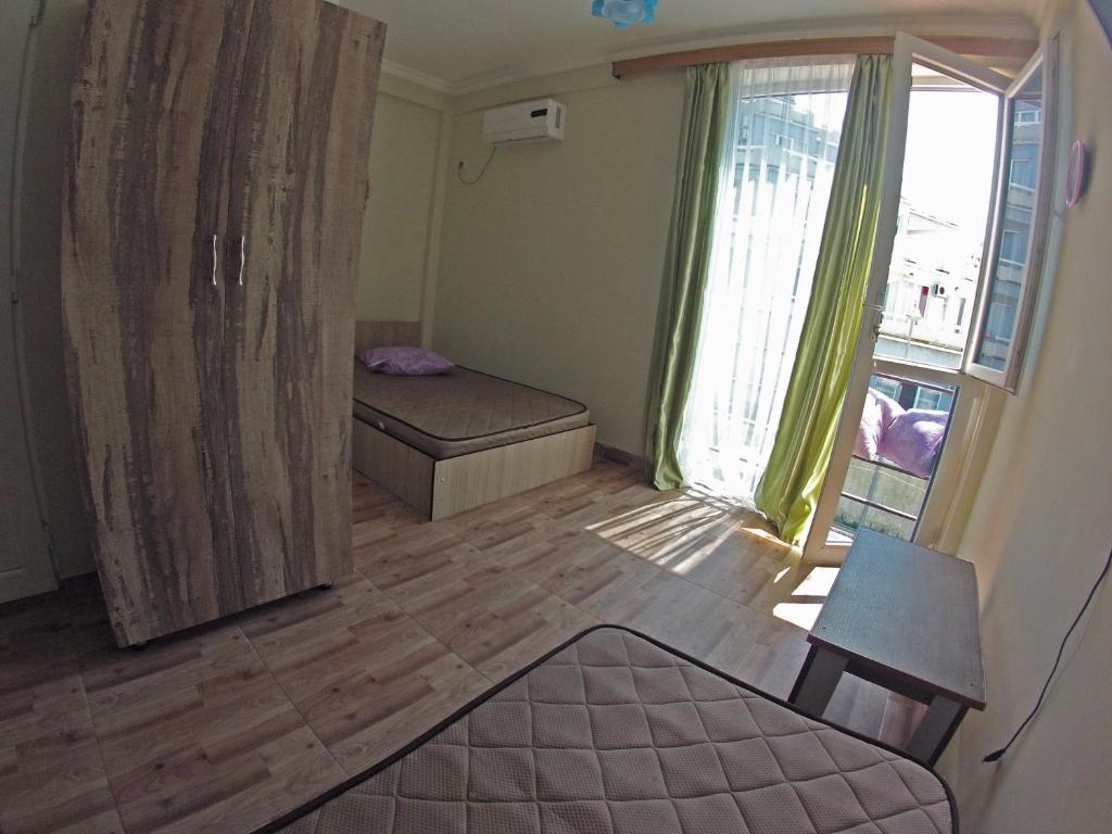 Postel nebo postele na pokoji v ubytování Magnetic Sand Hotel