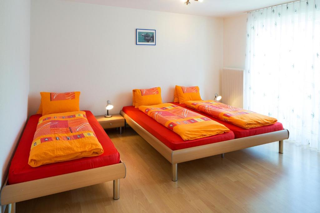 Postel nebo postele na pokoji v ubytování Hotel Sörenberg