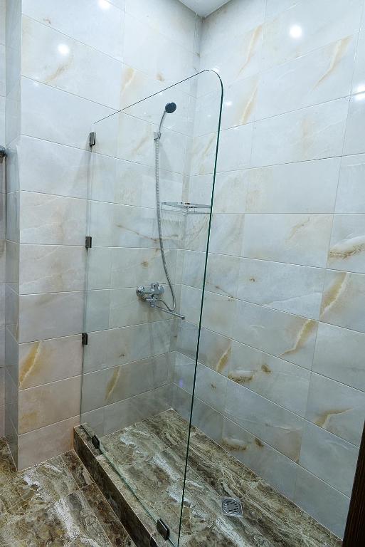 Koupelna v ubytování MGK Hotel