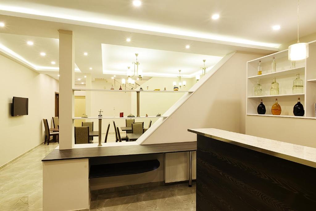 Kuchyň nebo kuchyňský kout v ubytování MGK Hotel