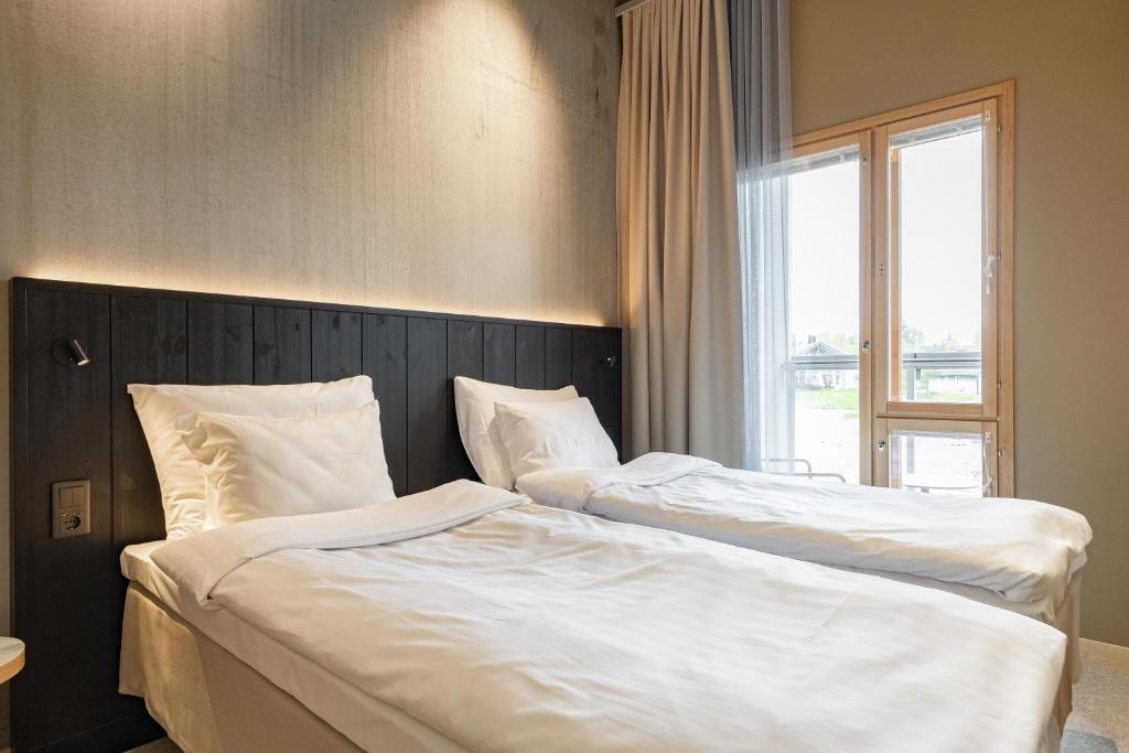 Postel nebo postele na pokoji v ubytování Break Sokos Hotel Himos