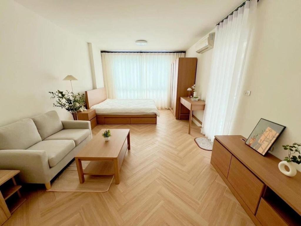 Ένα ή περισσότερα κρεβάτια σε δωμάτιο στο Minimal Condo At Ramkhamhaeng 64