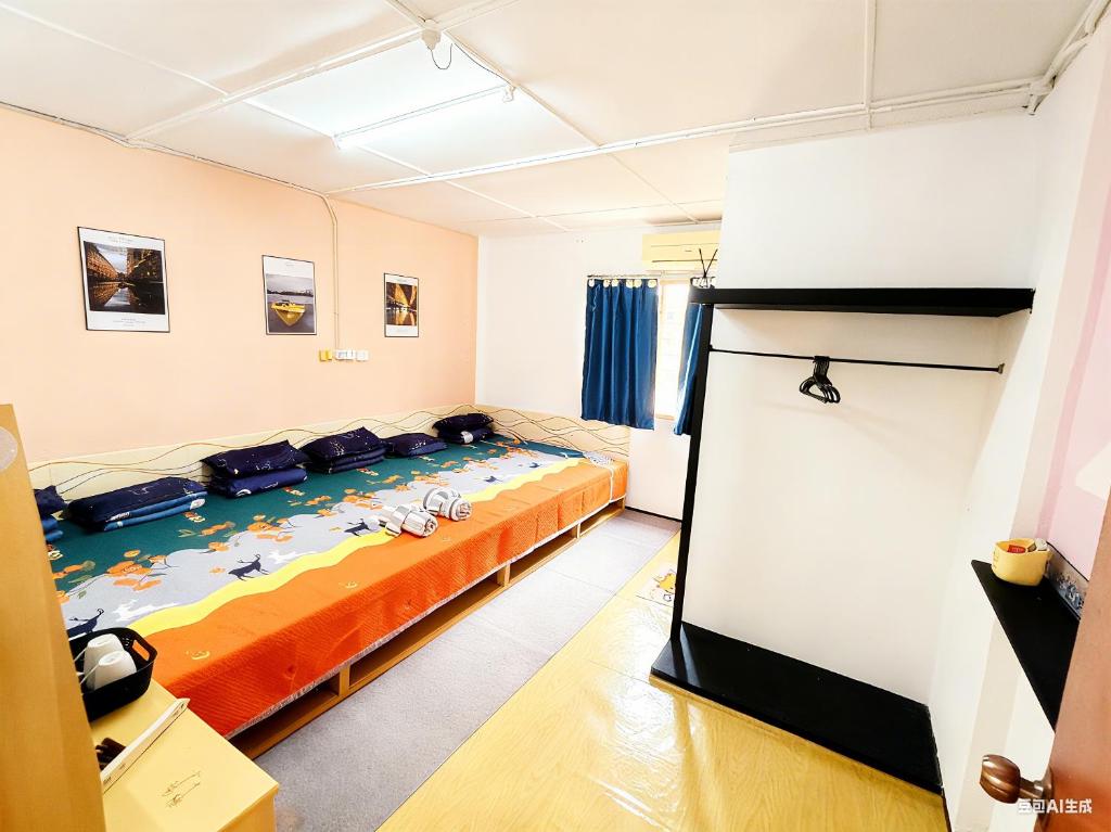 Un pat sau paturi într-o cameră la 玖月舒苑 0529