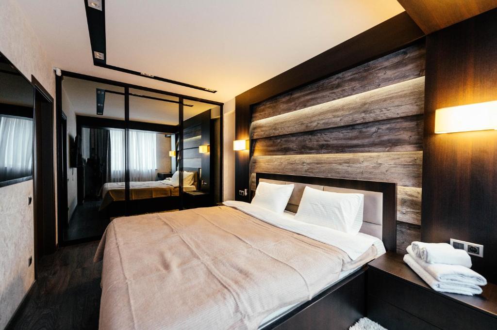 Ένα ή περισσότερα κρεβάτια σε δωμάτιο στο Bright & Modern Flat by the Circus