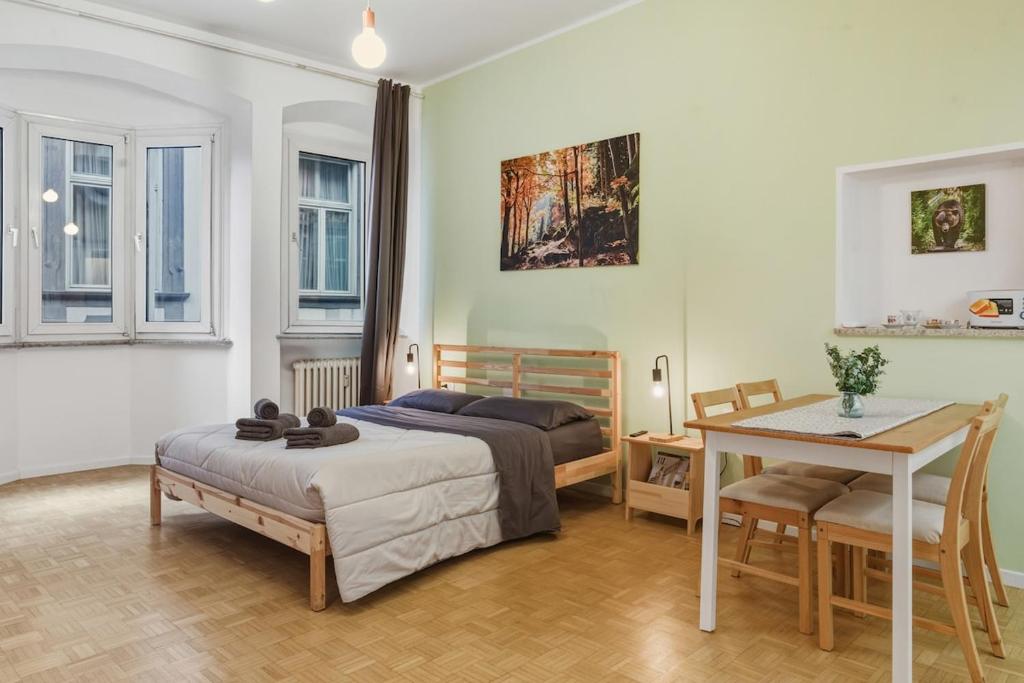 En eller flere senge i et værelse på Lauben Apartment II Bolzano