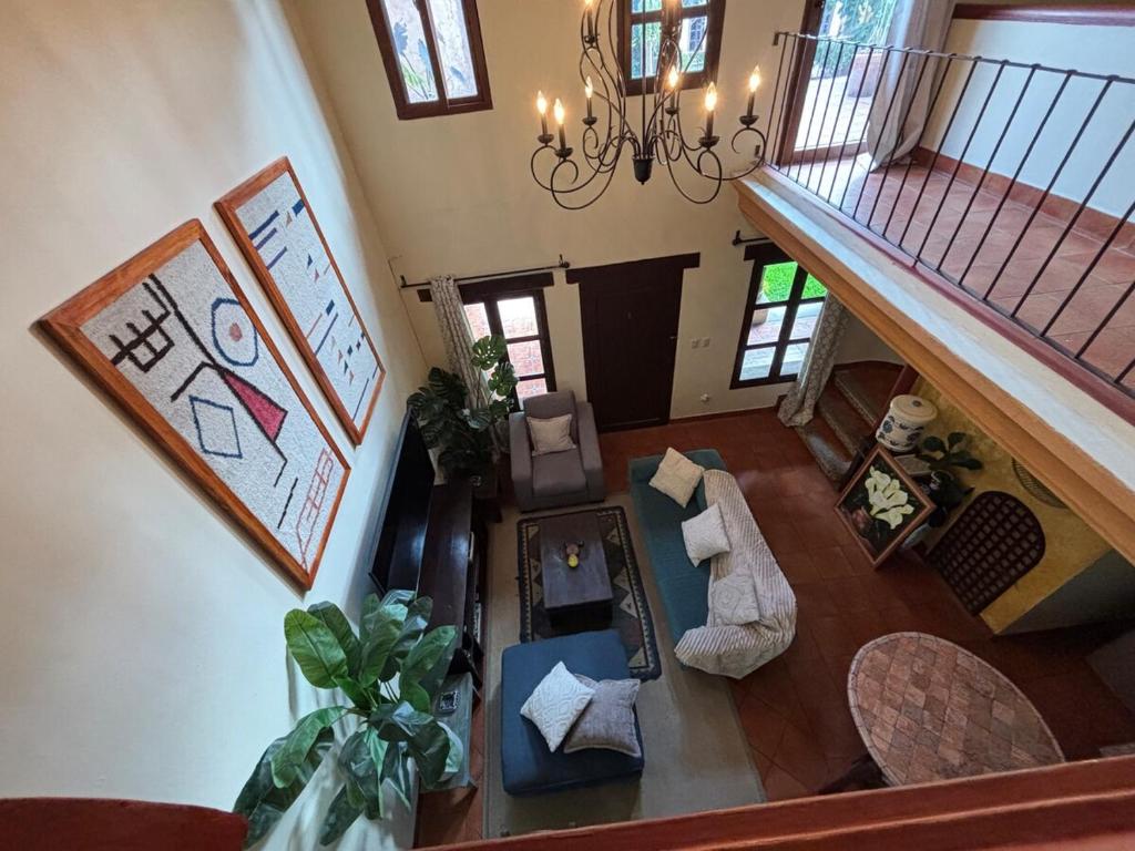 an overhead view of a living room in a house at Cozy Loft & Terrace in Antigua in Antigua Guatemala