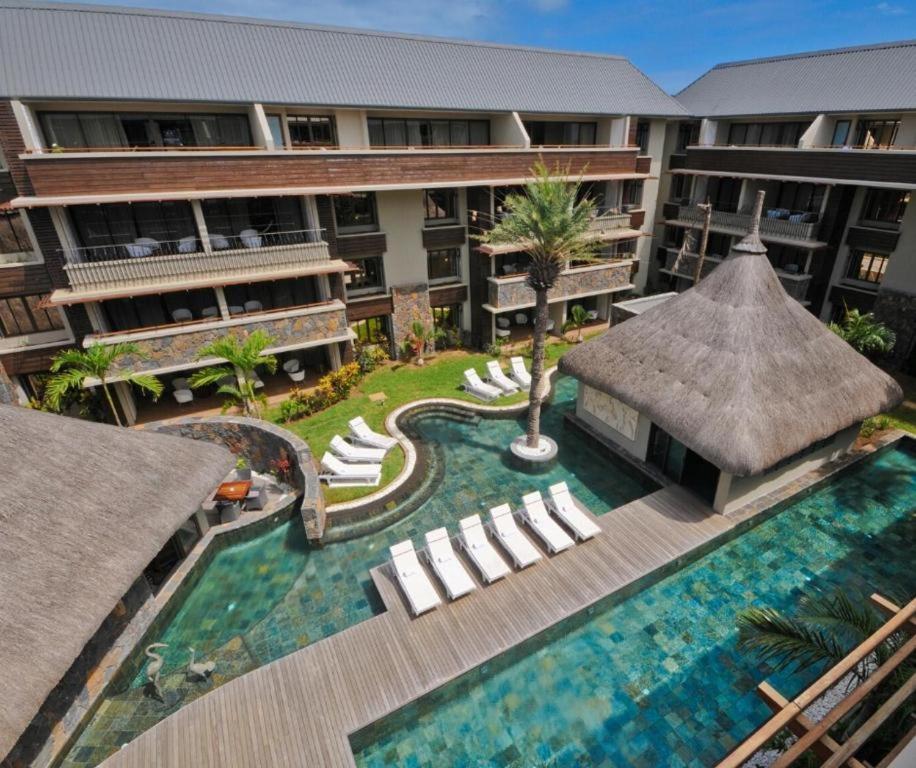 an aerial view of a resort with a swimming pool at Residence Alizees Spa in Mauritius