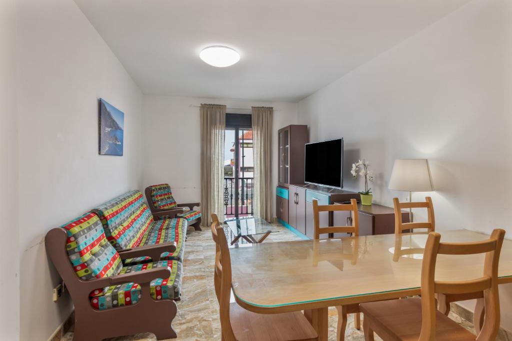 TV a/nebo společenská místnost v ubytování Luján 1a Entre Hogueras Y Luces