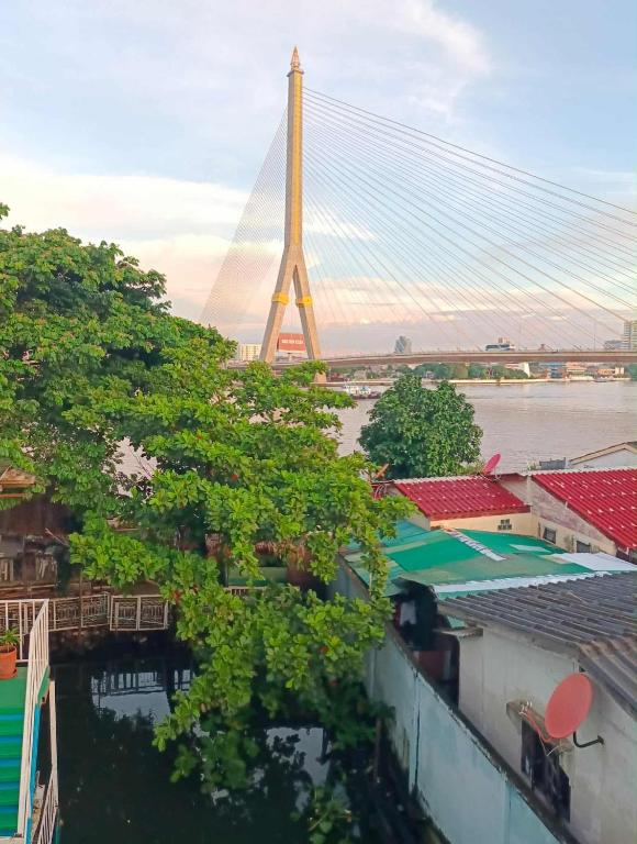 تصویر اتاق‌های New Phiman Riverview Guesthouse - تصویر ۲