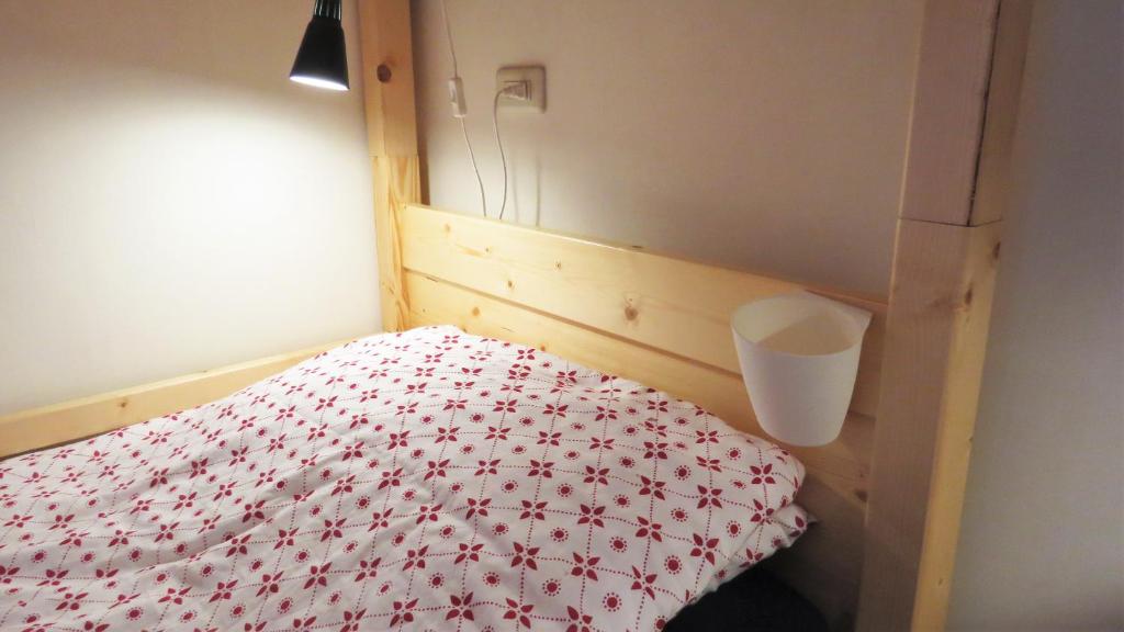 Postel nebo postele na pokoji v ubytování Dali Yi International Hostel