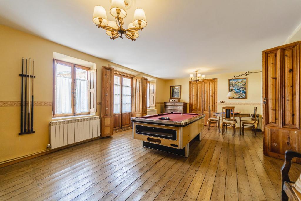 a living room with a pool table in it at Abánades in Melgar de Fernamental