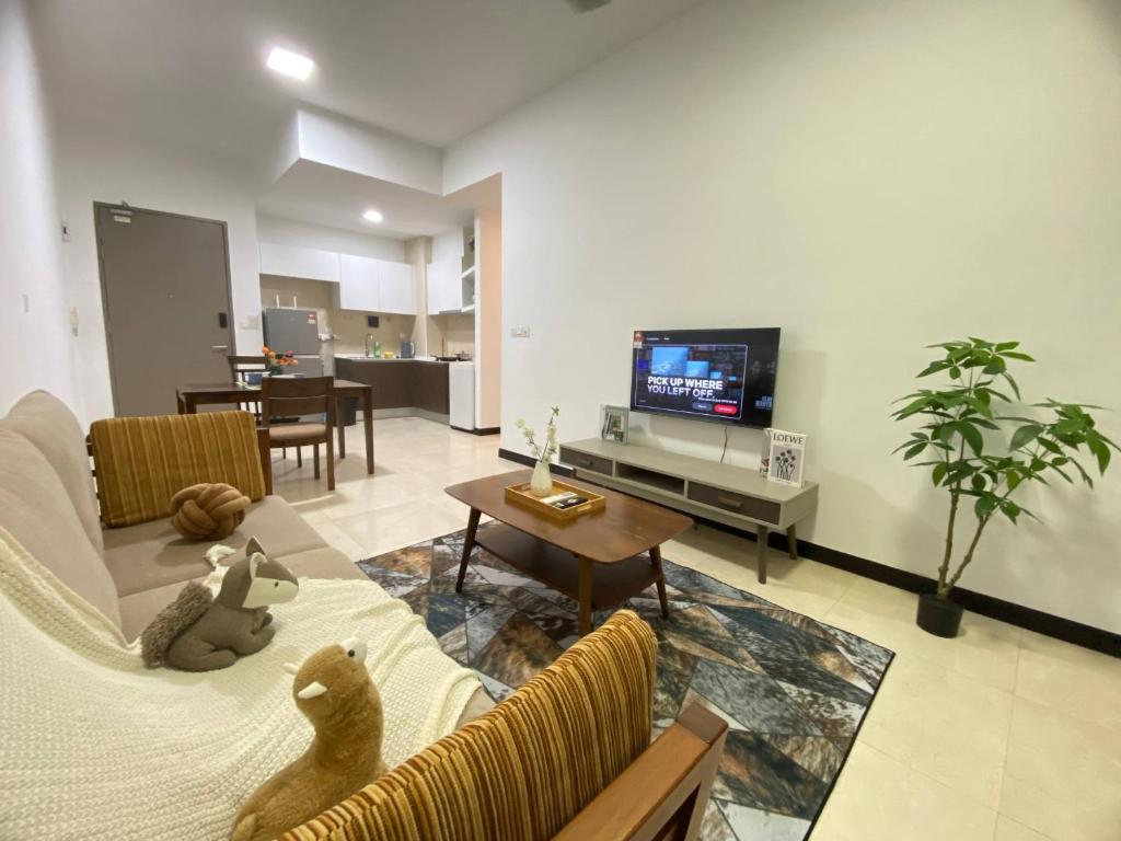 TV a/nebo společenská místnost v ubytování Bella Vista Silverscape Seaview Homestay by Jeffery Lam Home Management