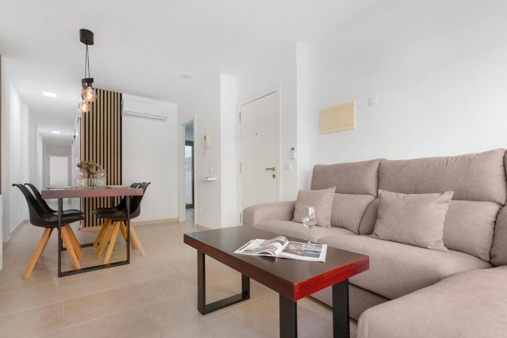 a living room with a couch and a table at Casa Castilla in Puerto del Rosario