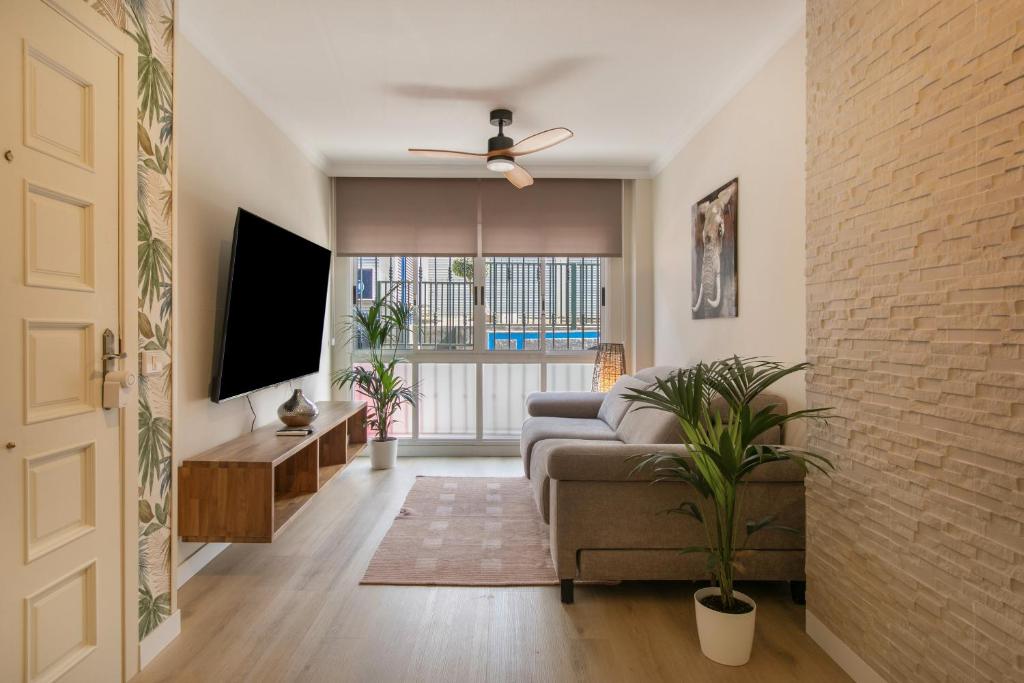 TV a/nebo společenská místnost v ubytování Casa Calma Zona Hospital