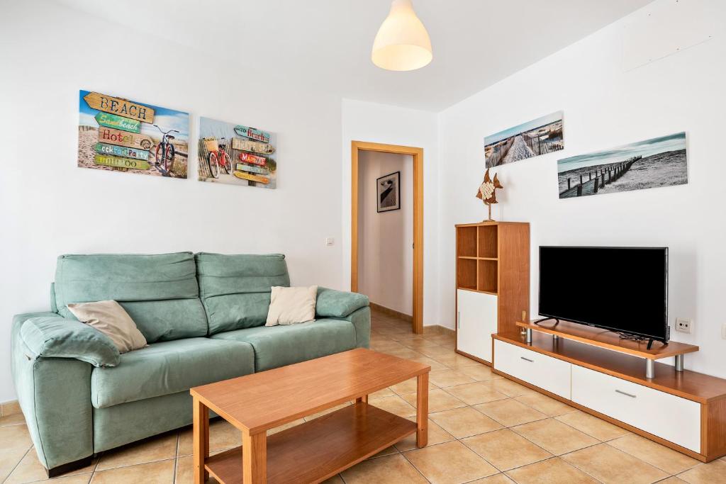 TV a/nebo společenská místnost v ubytování Casa Señores Cura 1 - Solo Familias