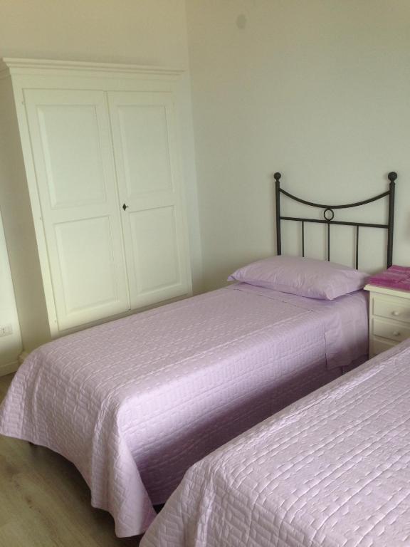 Postel nebo postele na pokoji v ubytování B&B Villa Inn