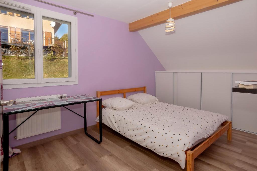 Postel nebo postele na pokoji v ubytování Chalet 6 à 8 pers au bord du lac