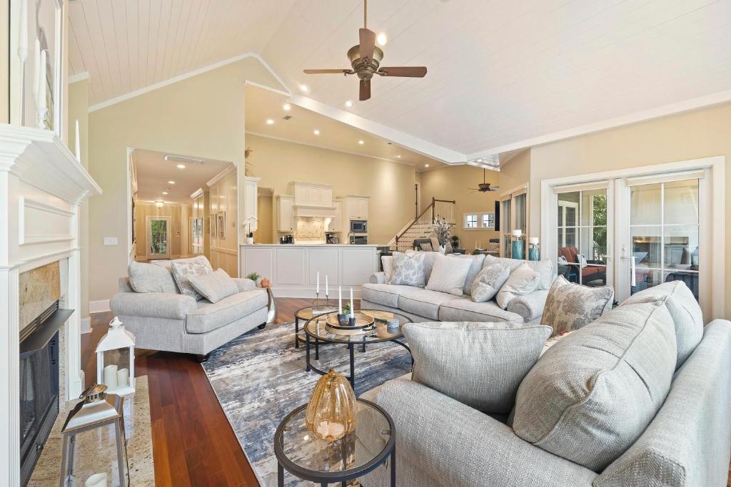 a living room with two couches and a fireplace at BW3038: 3038 Baywood Drive in Seabrook Island