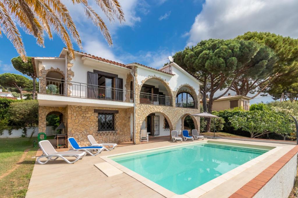 Swimmingpoolen hos eller tæt på Villa Amistad