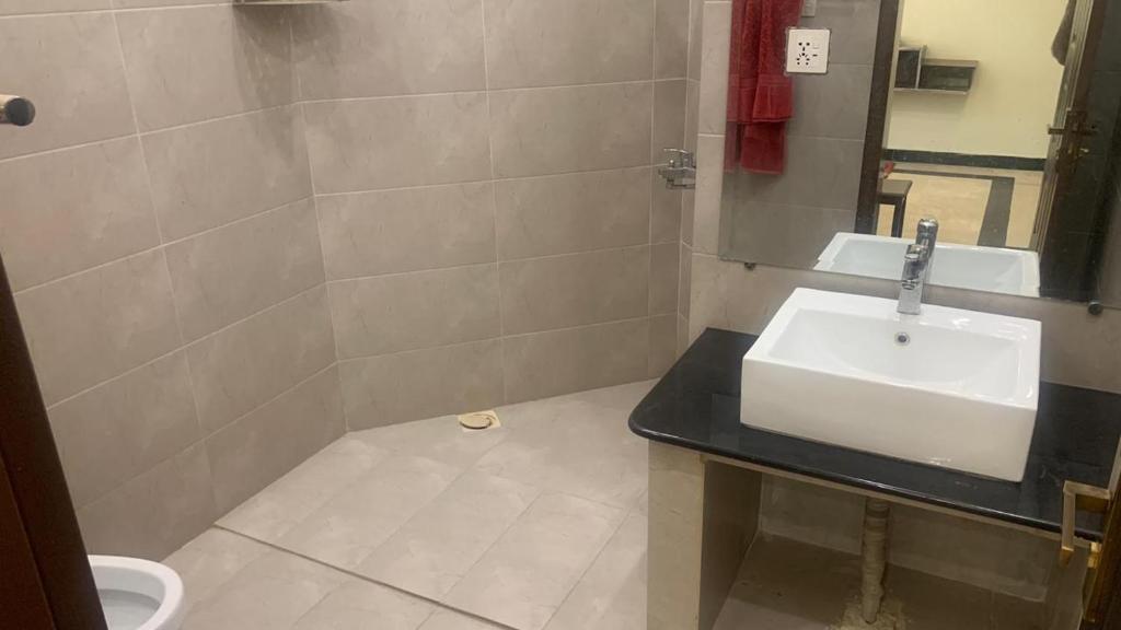 Koupelna v ubytování Iqbal's Den