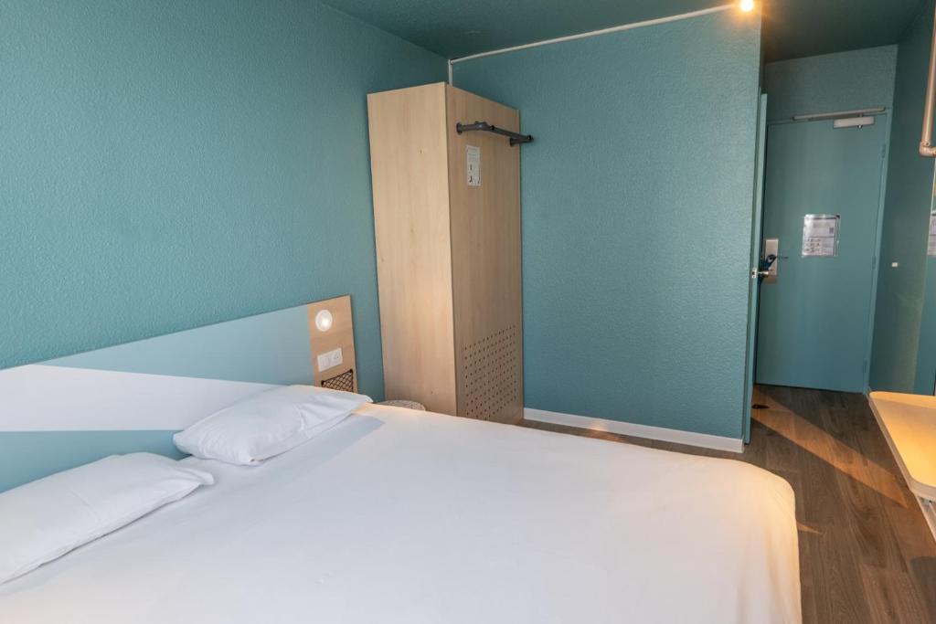 Ibis budget Brest Sud Plougastel - Hôtel rénové - Chambre Triple Avec Un Lit Double Et Un Lit Simple
