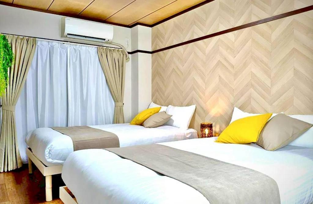 4 Beds & Great for Long Stays , Kyocera Dome Nearby , USJ & Namba 15min , Direct to KIX , Guest House 大正