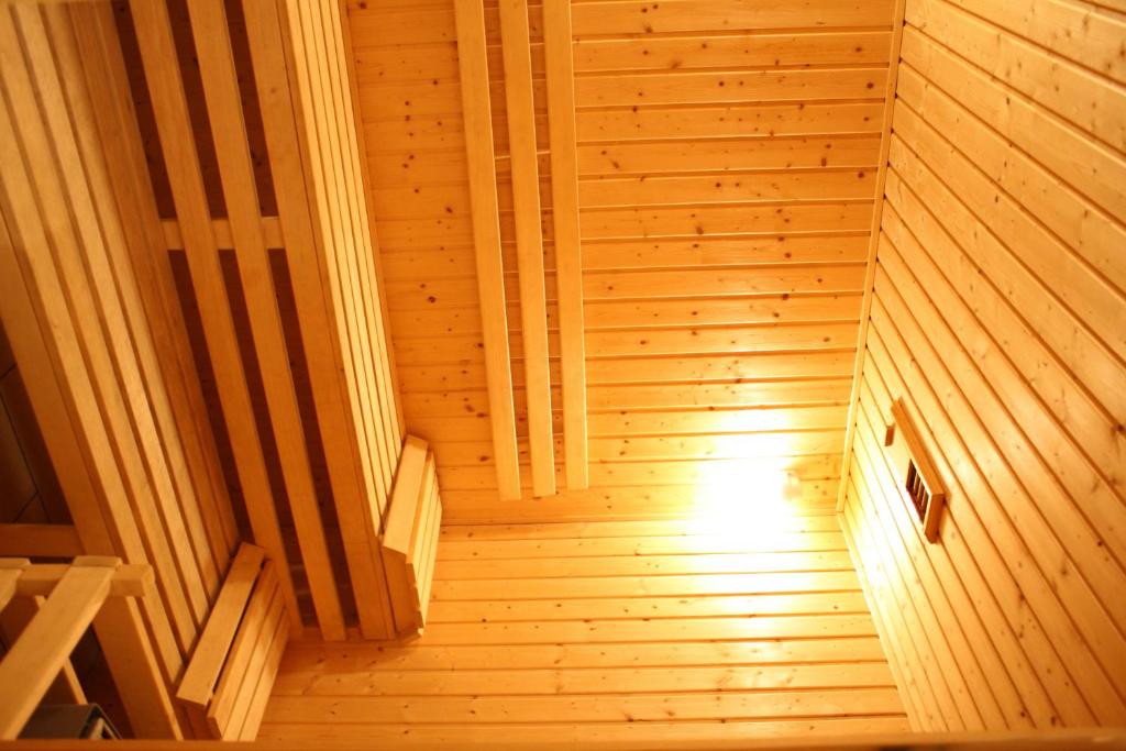 an overhead view of a room with a wooden ceiling at Hotel Danica in Petrovac na Moru