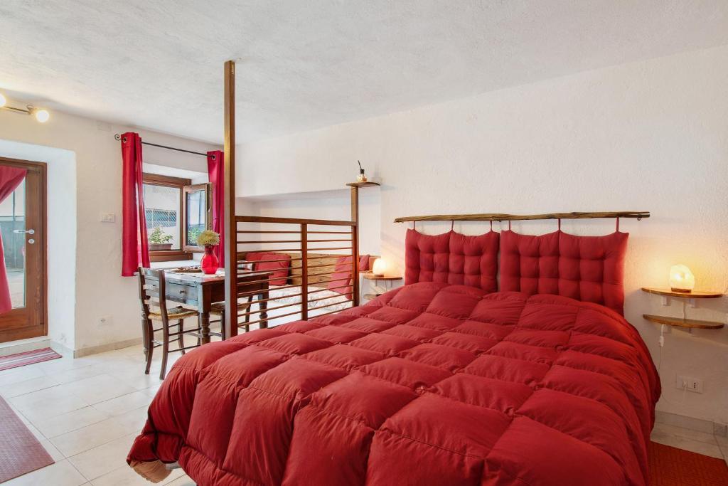 Ένα ή περισσότερα κρεβάτια σε δωμάτιο στο Nel Cuore della Via Francigena