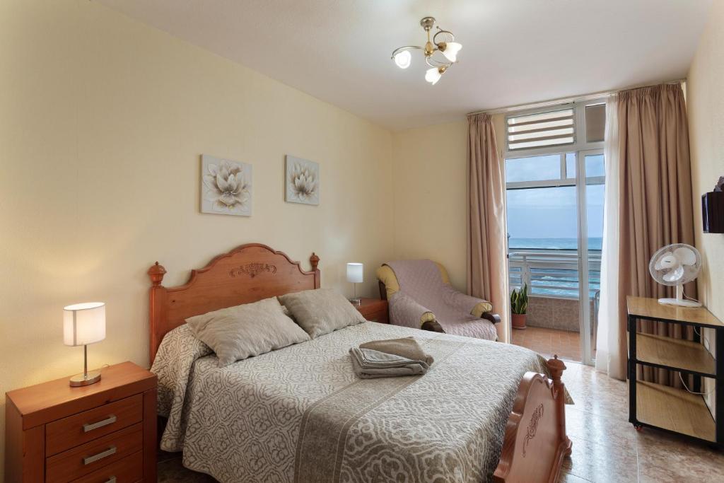 Postel nebo postele na pokoji v ubytování Un Guiño Al Mar