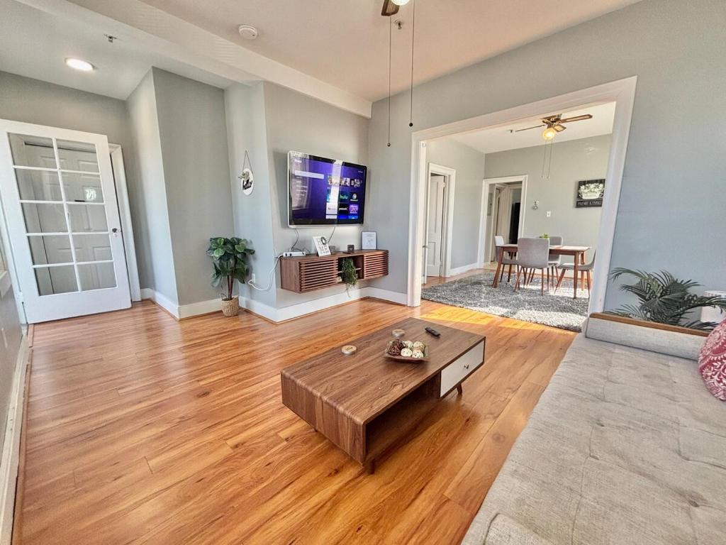 a living room with a couch and a table at FREE Parking near NYC Washer and Dryer in North Bergen