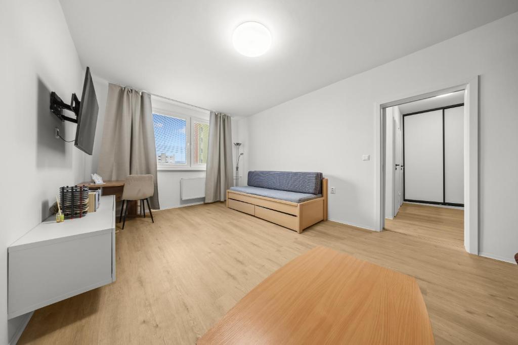 Et tv og/eller underholdning på Stylish New Apartment with Parking Place