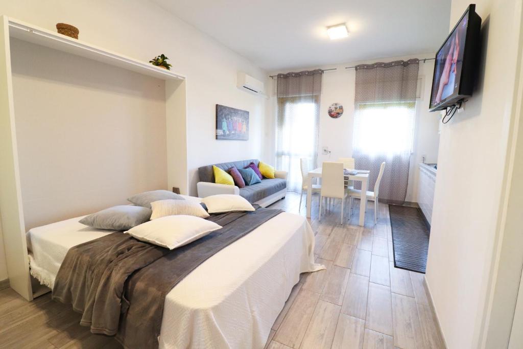 Et tv og/eller underholdning på Casa Vacanze Alba a Otranto