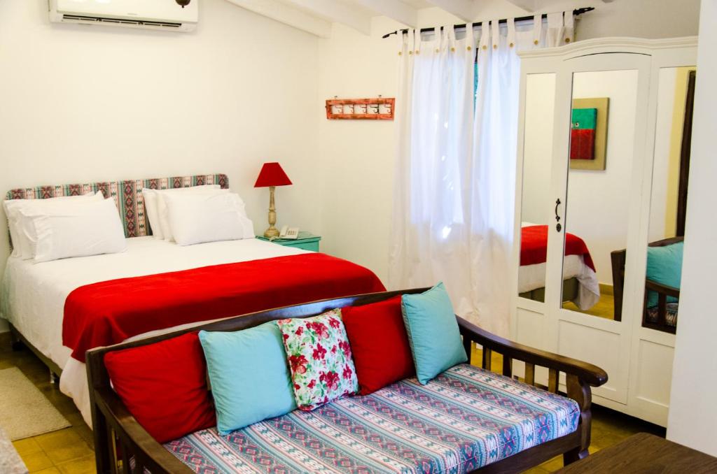 Postel nebo postele na pokoji v ubytování La Casona Hotel Boutique