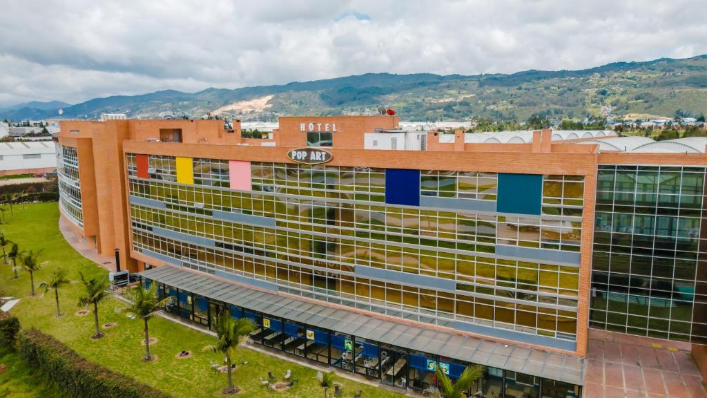 an overhead view of a building with colorful windows at Pop Art Hotel Tocancipá y Centro de Convenciones in Tocancipá
