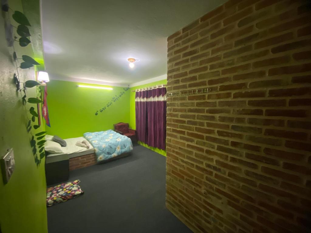 A bed or beds in a room at Home made guest house and netflix