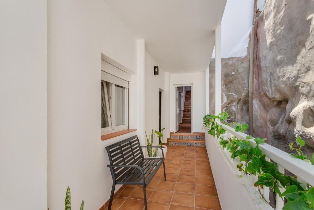 CazadoresにあるIbaialeのバルコニー(椅子、一部の植物付)