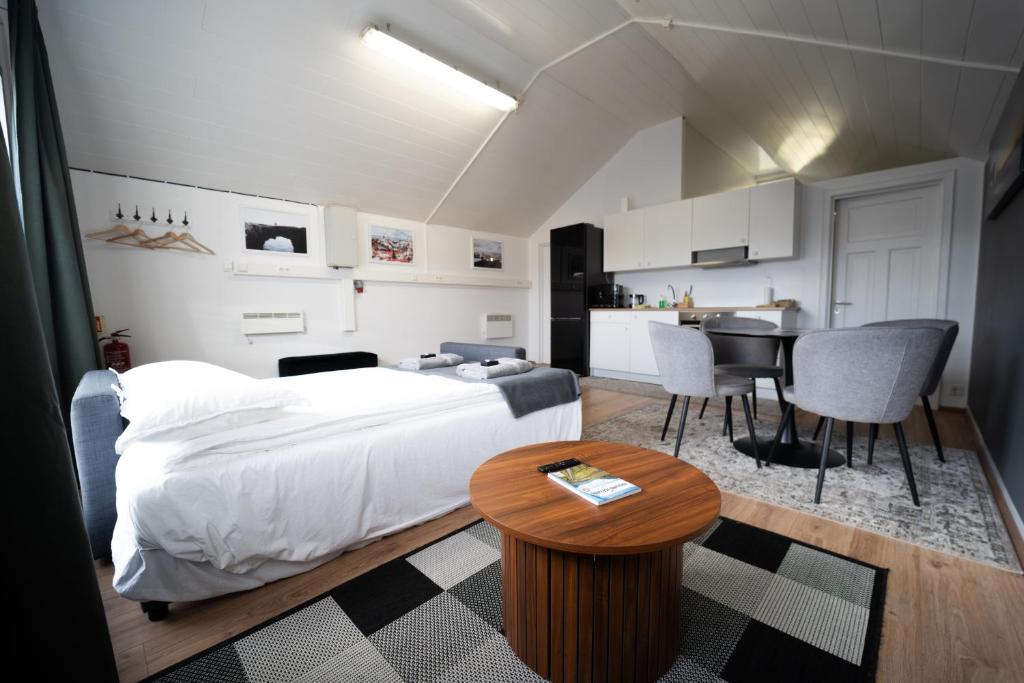 Postel nebo postele na pokoji v ubytování Vík Inn