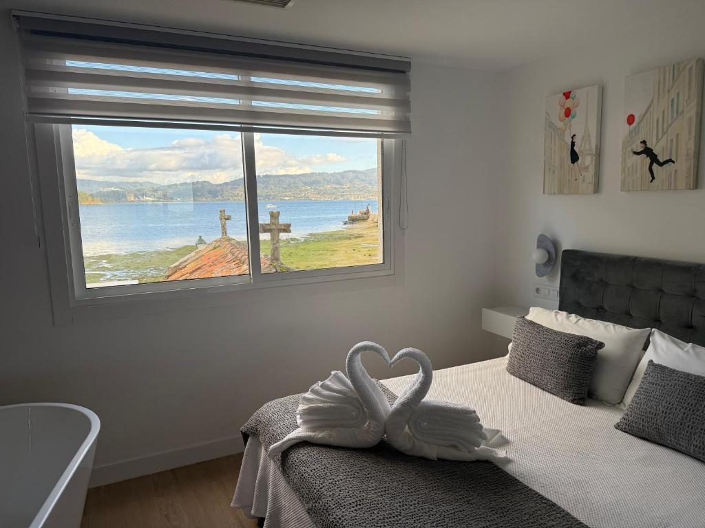 Postel nebo postele na pokoji v ubytování La Casa del Horreo