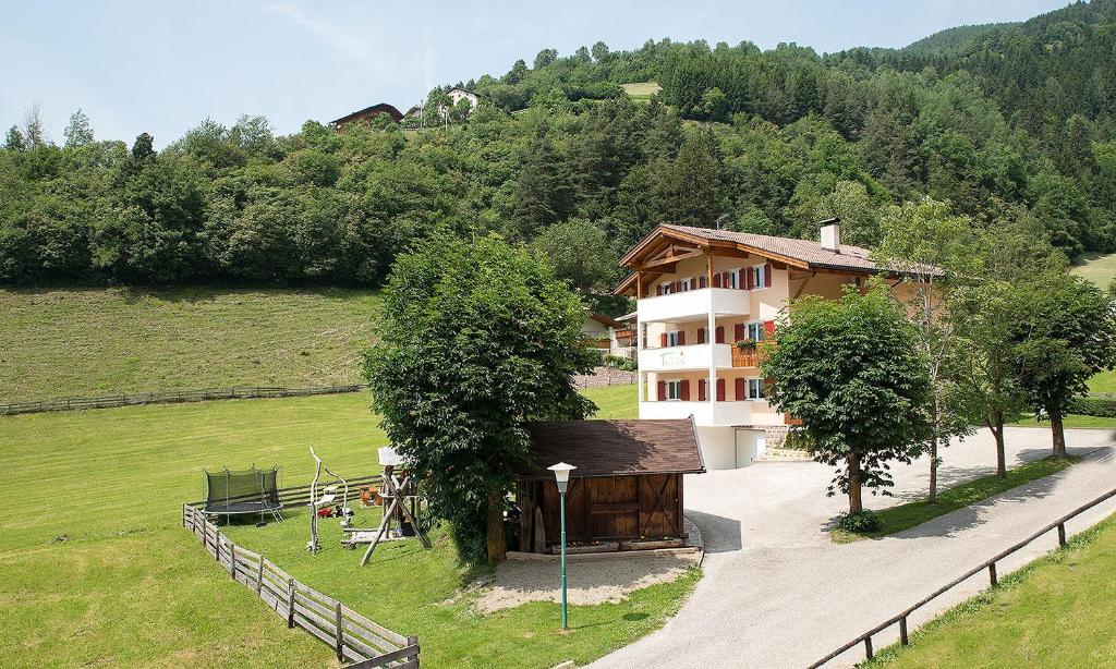 an aerial view of a building in a field at Talblick Apartement 1 in Laion