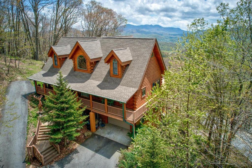 an overhead view of a log cabin in the woods at Elk Ridge Lodge in Banner Elk